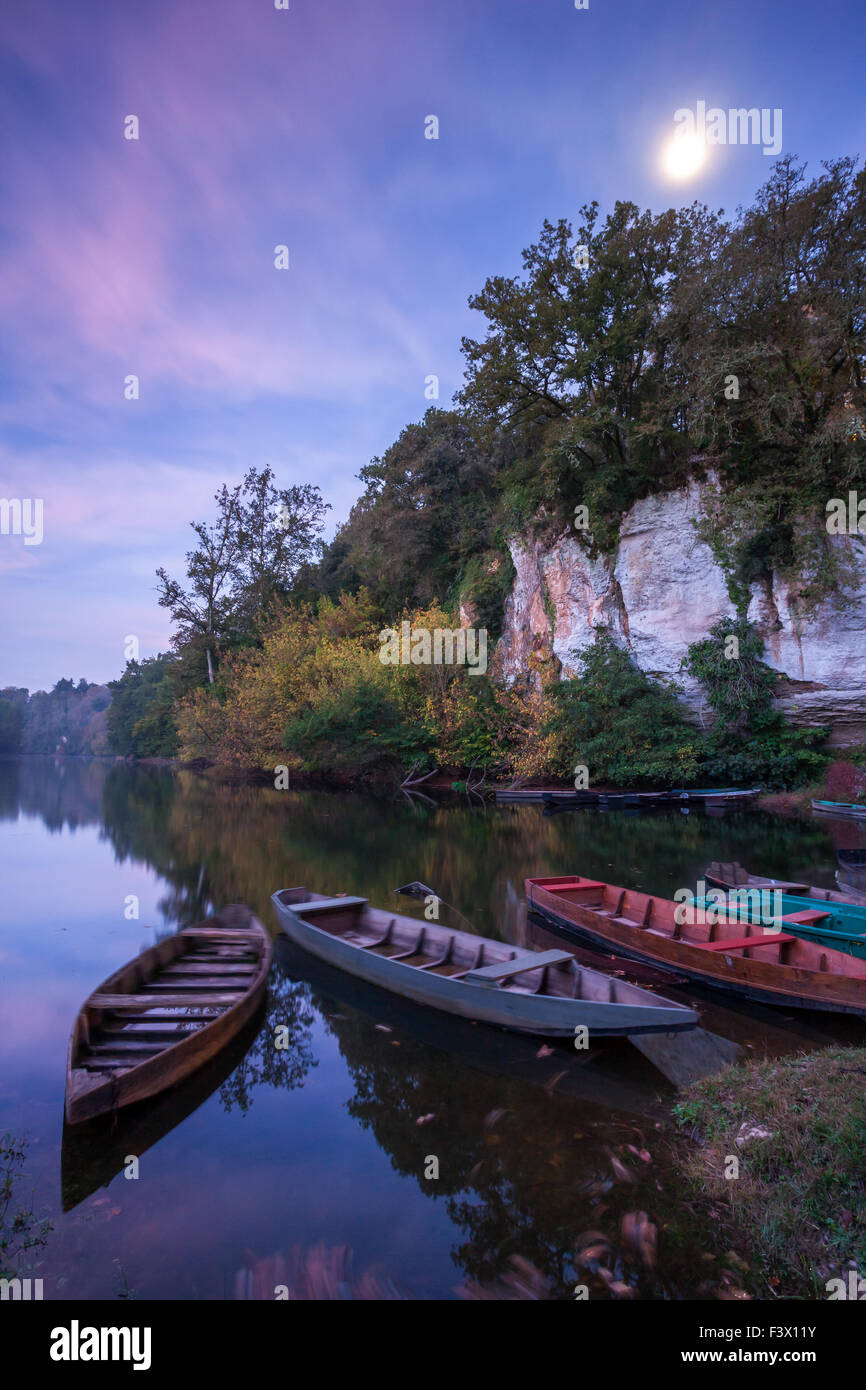Wooden boats of the Dordogne river at sunrise Stock Photo