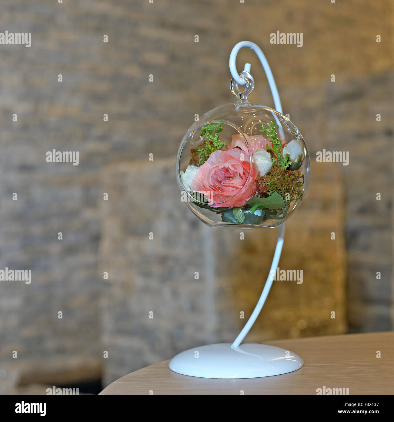 colorful of rose artificial flower in modern vase Stock Photo