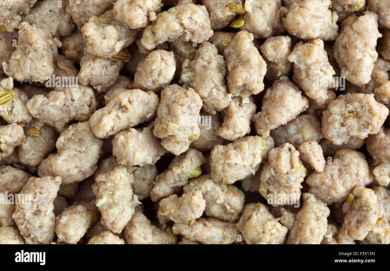 Top close view of a portion of crumbled Italian sausage illuminated with natural light. Stock Photo