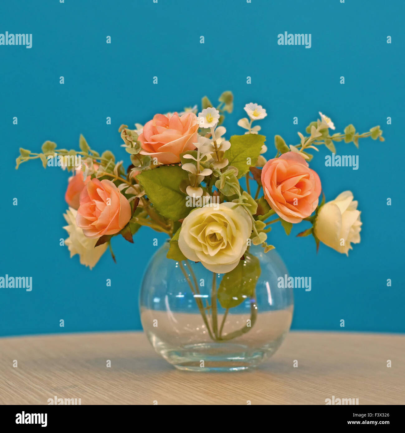 colorful of rose artificial flower in vase Stock Photo