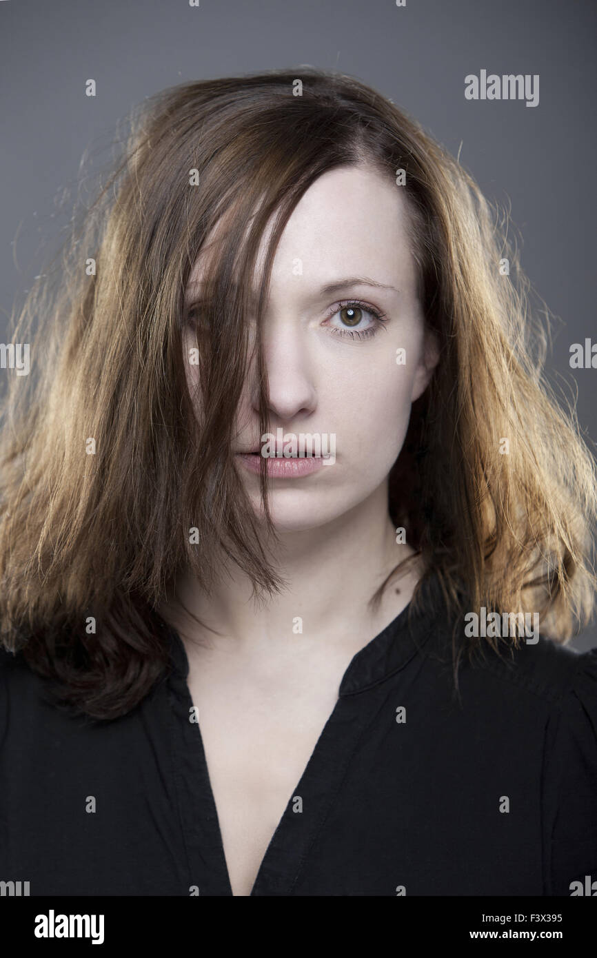Young woman with intense look Stock Photo
