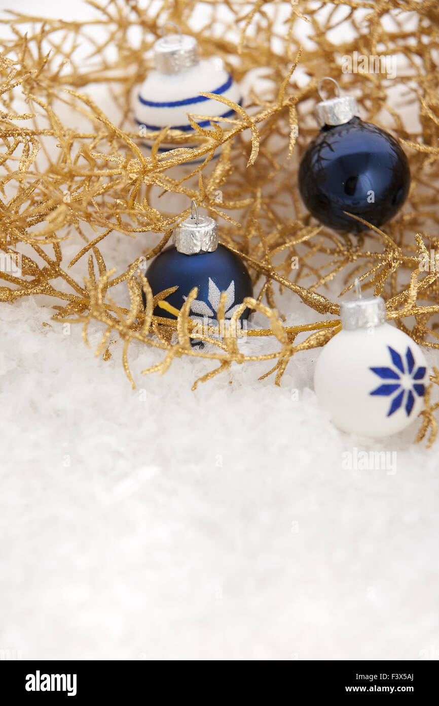 Golden Christmas decoration with snow Stock Photo