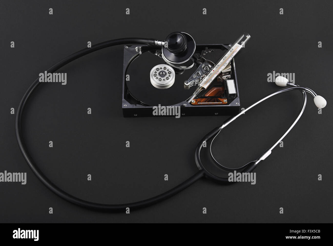 Hard disk with stethoscope Stock Photo