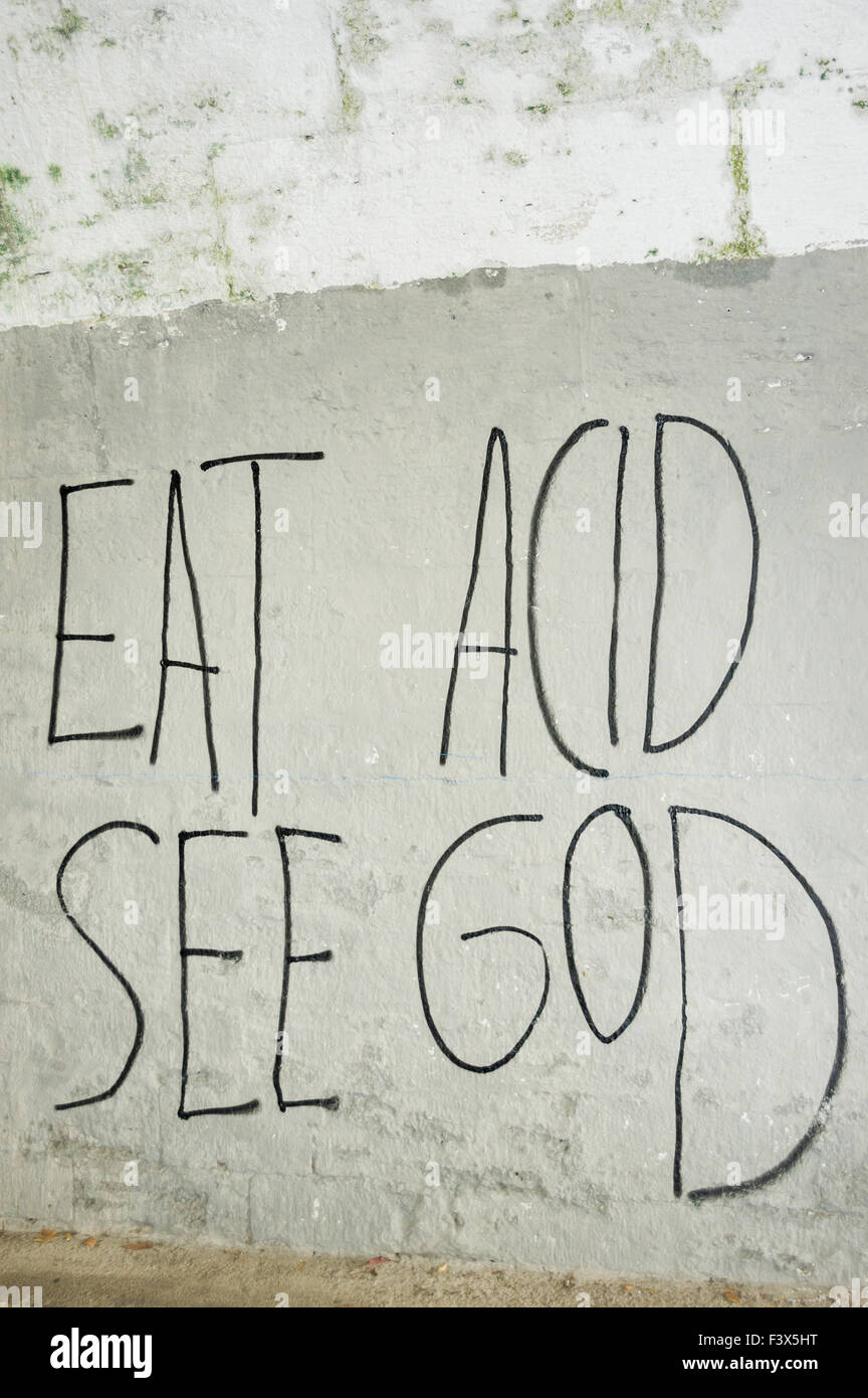 eat acid, see god Stock Photo