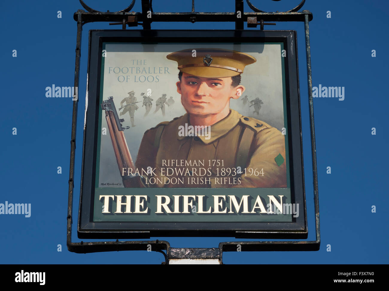 sign for the rifleman pub, twickenham, england, depicting frank edwards, the first world war 'footballer of loos' Stock Photo