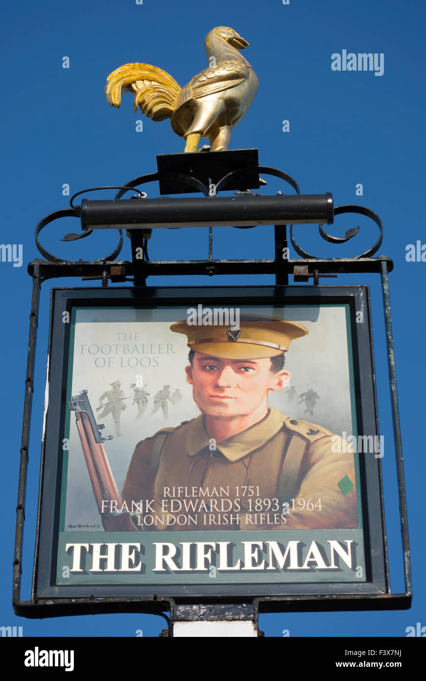 sign for the rifleman pub, twickenham, england, depicting frank edwards, the first world war 'footballer of loos' Stock Photo