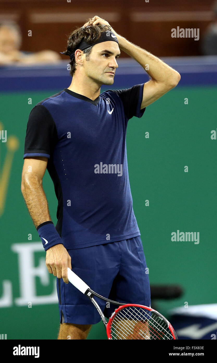 Shanghai, China. 13th Oct, 2015. Roger Federer of Switzerland reacts during the men's singles second round match against Albert Ramos-Vinolas of Spain at Shanghai Masters tennis tournament in Shanghai, China, Oct. 13, 2015. Federer lost the match 1-2. Credit:  Fan Jun/Xinhua/Alamy Live News Stock Photo