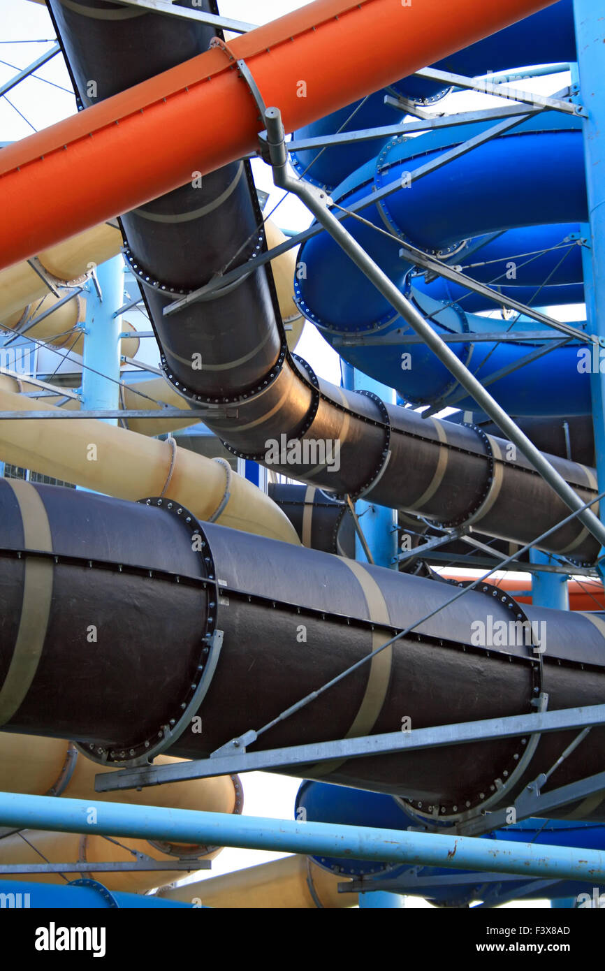 Twisting, colorful water chutes wind around Stock Photo Alamy