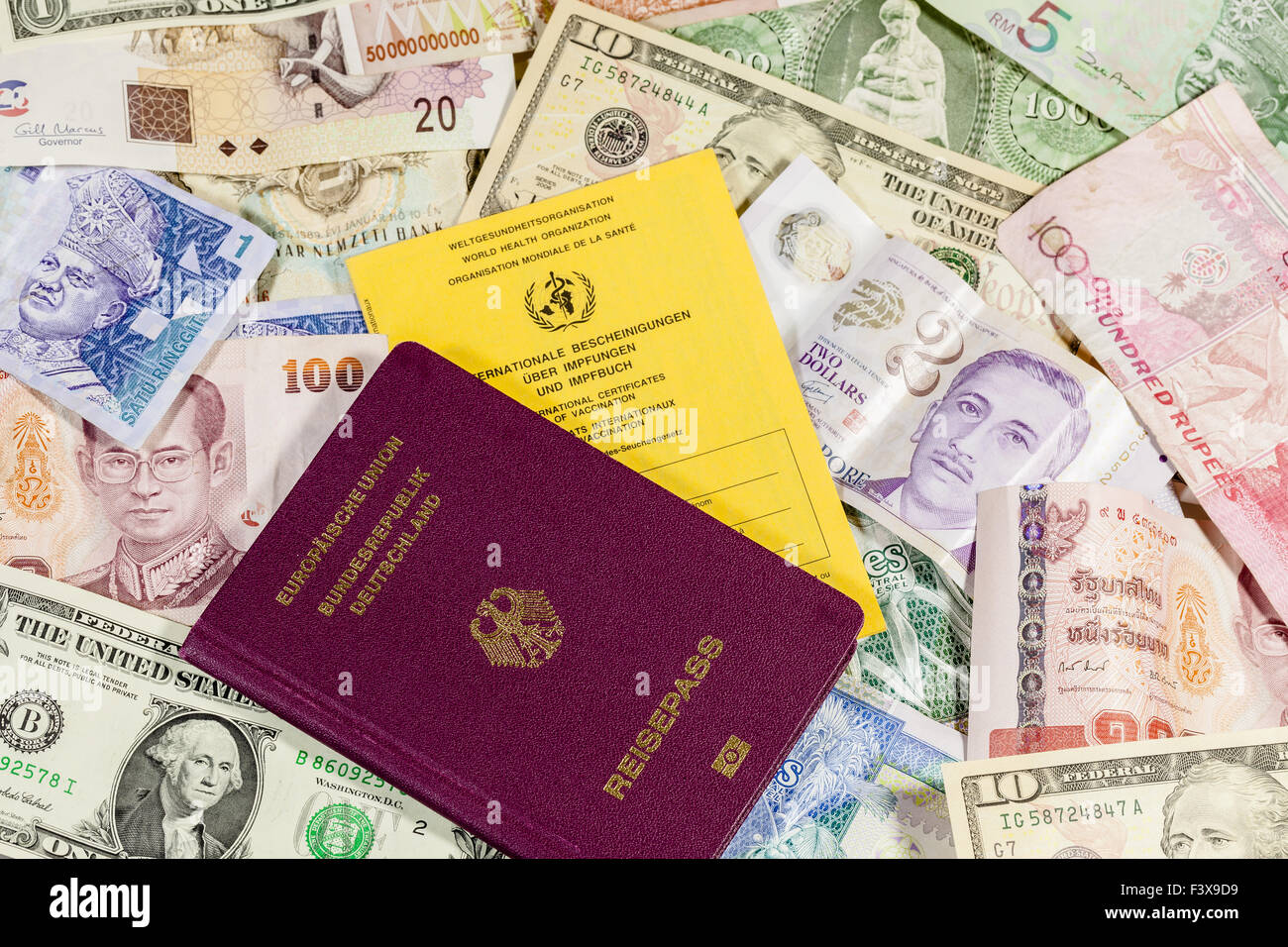 Currency and passport Stock Photo