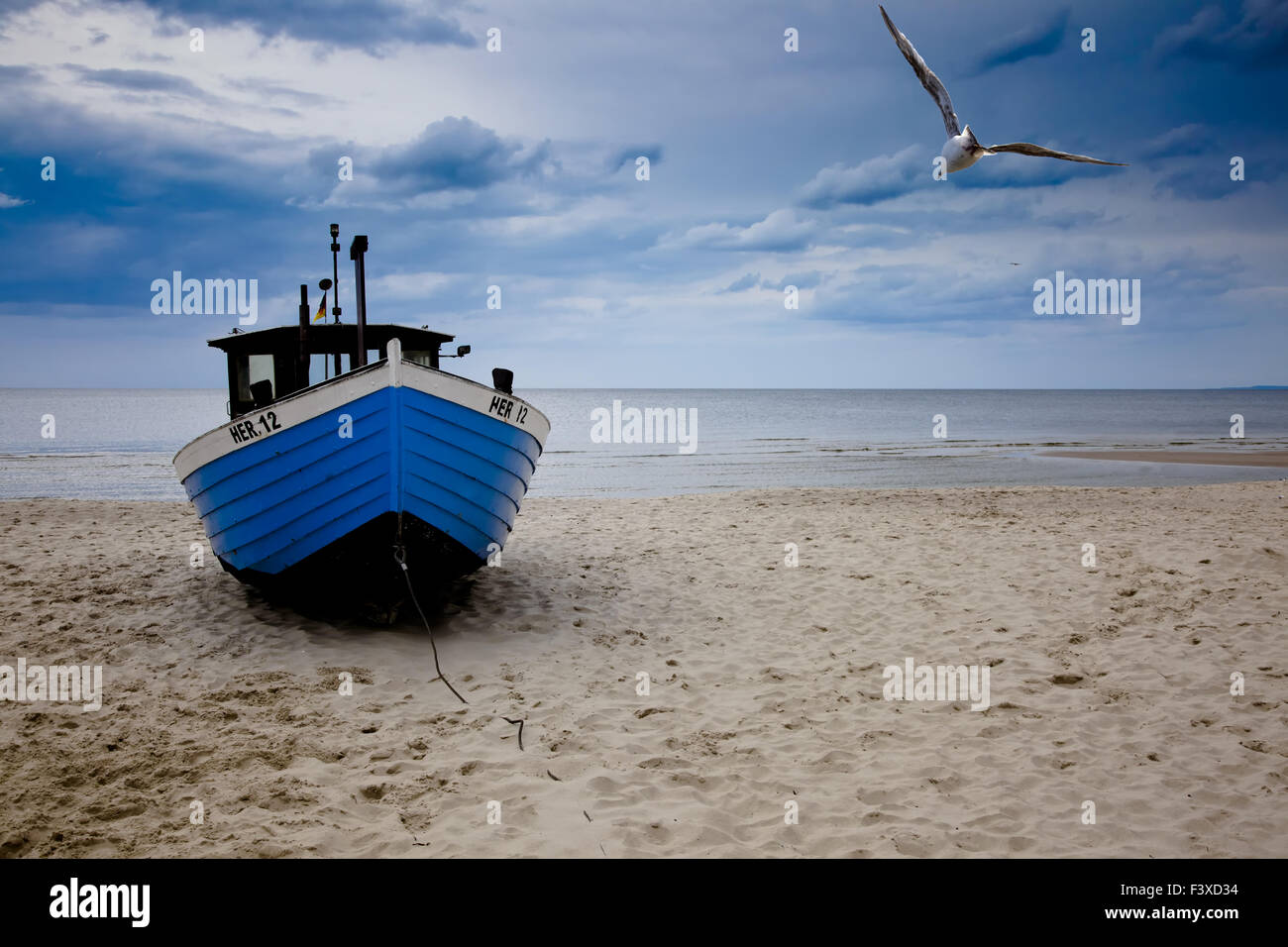 Fishing boat on the beach Stock Photo