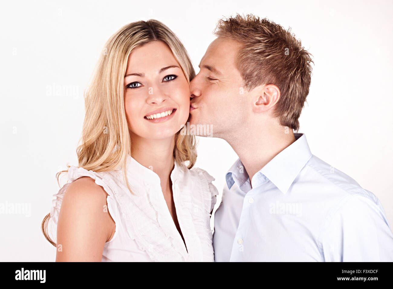 happy couple kissing Stock Photo