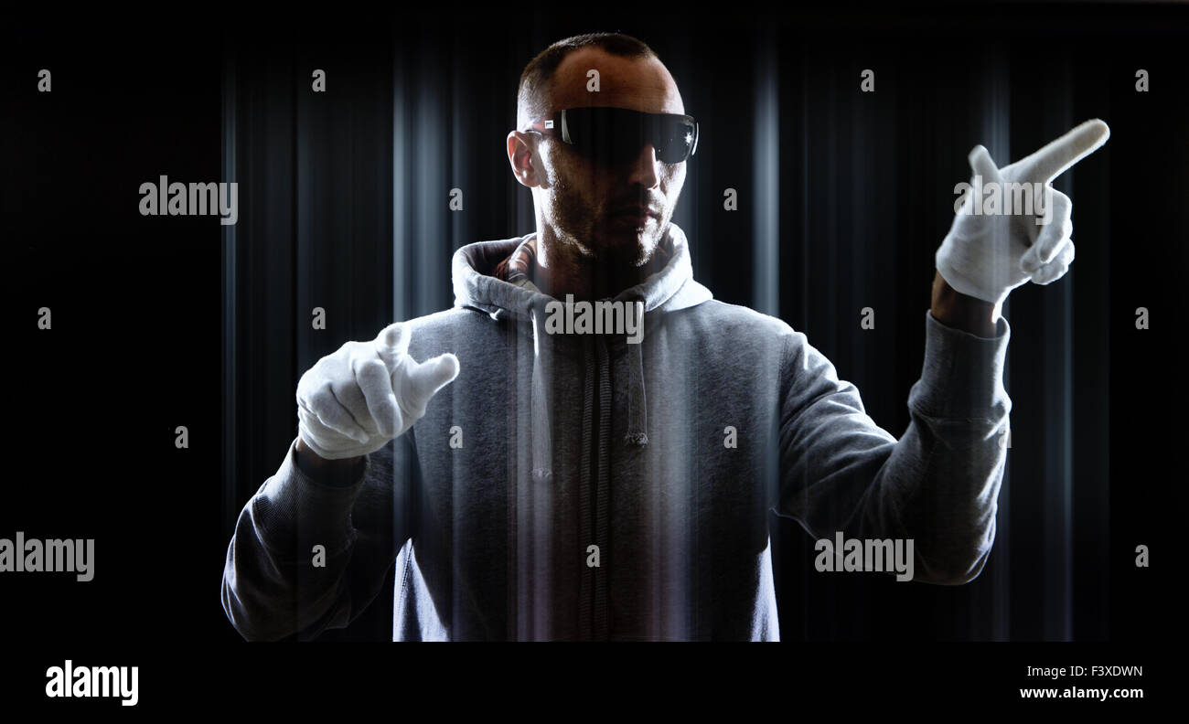 Hacker hacking on futuristic computer keyboard Stock Photo - Alamy