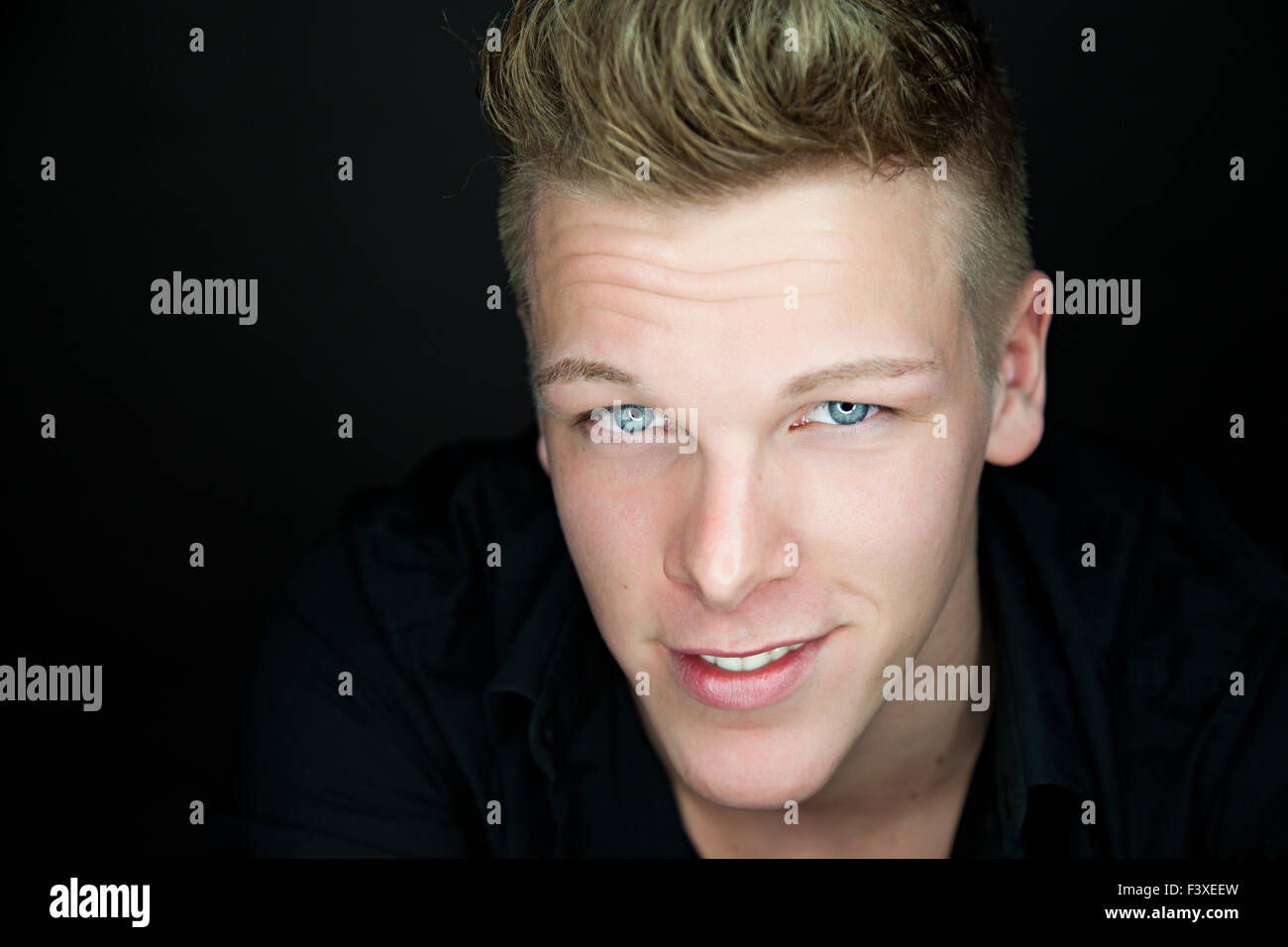 Portrait of a beautiful young blond man Stock Photo - Alamy