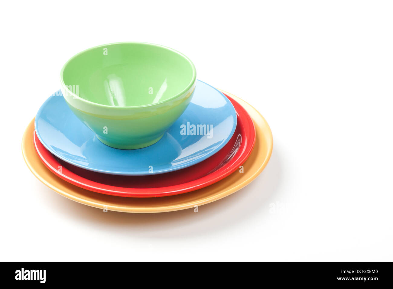 Colorful plates isolated on white Stock Photo Alamy