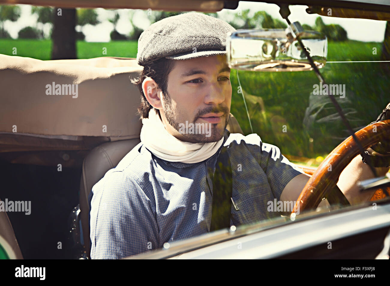 Man at steering wheel hi-res stock photography and images - Alamy