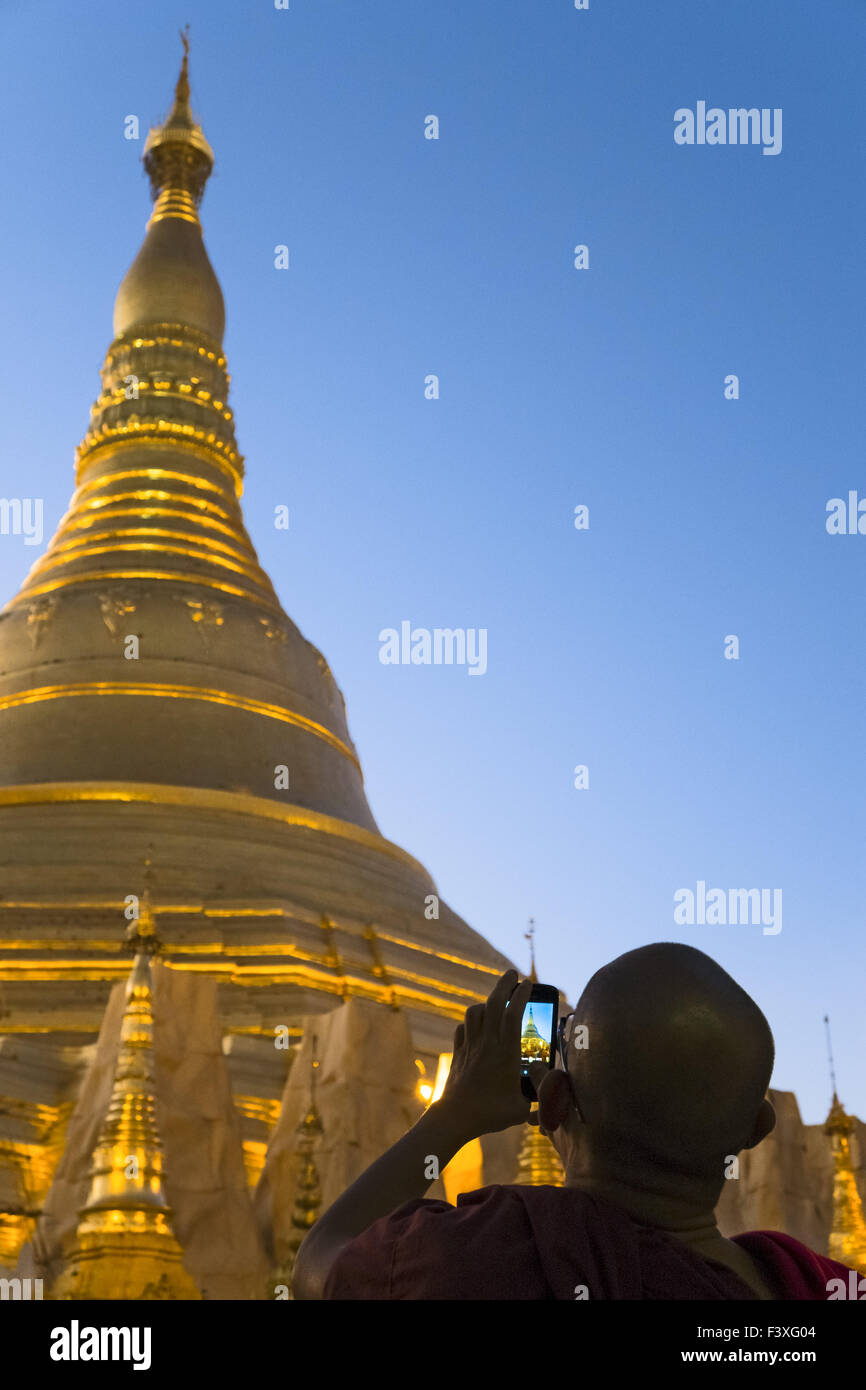 Monk at Shwedagon Pagoda, Yangon Stock Photo