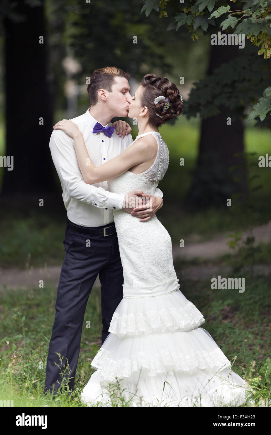 Happy married couple kissing on hi-res stock photography and images - Alamy