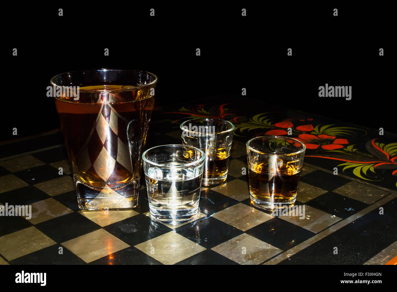 Russian Alcohol checkers with splashes of whiskey. Low-Key Stock Photo ...