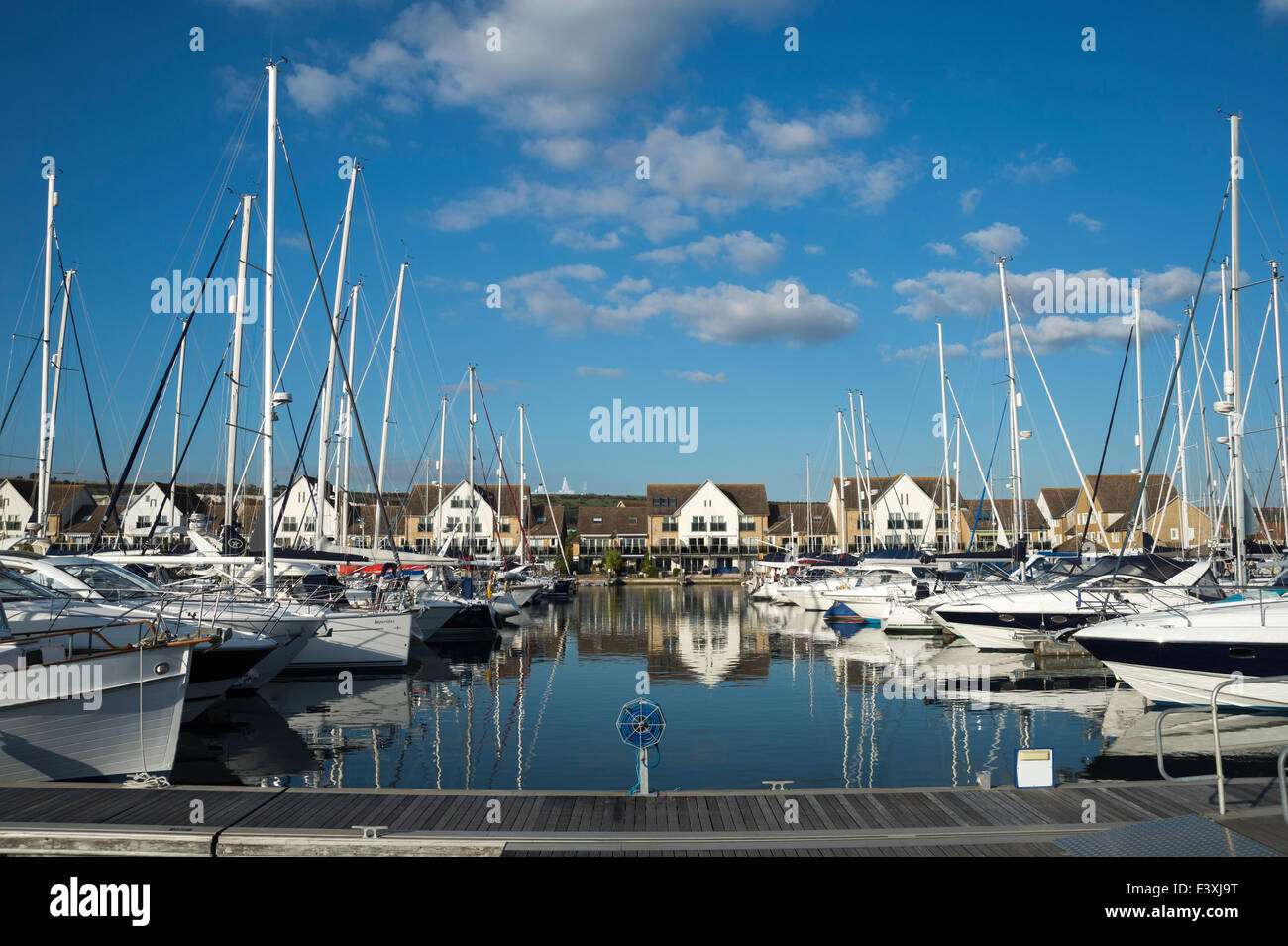 Yachts moored in Port Solent, luxury marina and houses. Stock Photo