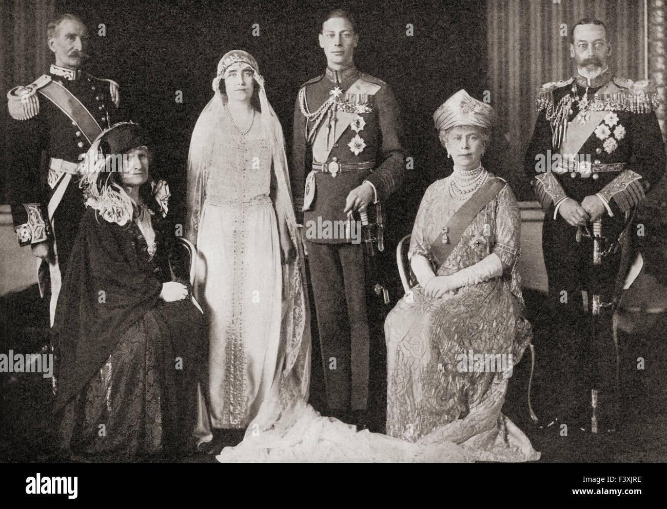 The British Royal Family at the wedding of The Duke and Duchess of York, 1923. From left to right, Claude George Bowes-Lyon, 14th Earl of Strathmore and Kinghorne, the bride's father.  Cecilia Nina Bowes-Lyon, Countess of Strathmore and Kinghorne, née Cavendish-Bentinck, the bride's mother.  Elizabeth Angela Marguerite Bowes-Lyon.   The Duke of York, later King George VI.  Mary of Teck, the groom's mother.  King George V, the groom's father. Stock Photo