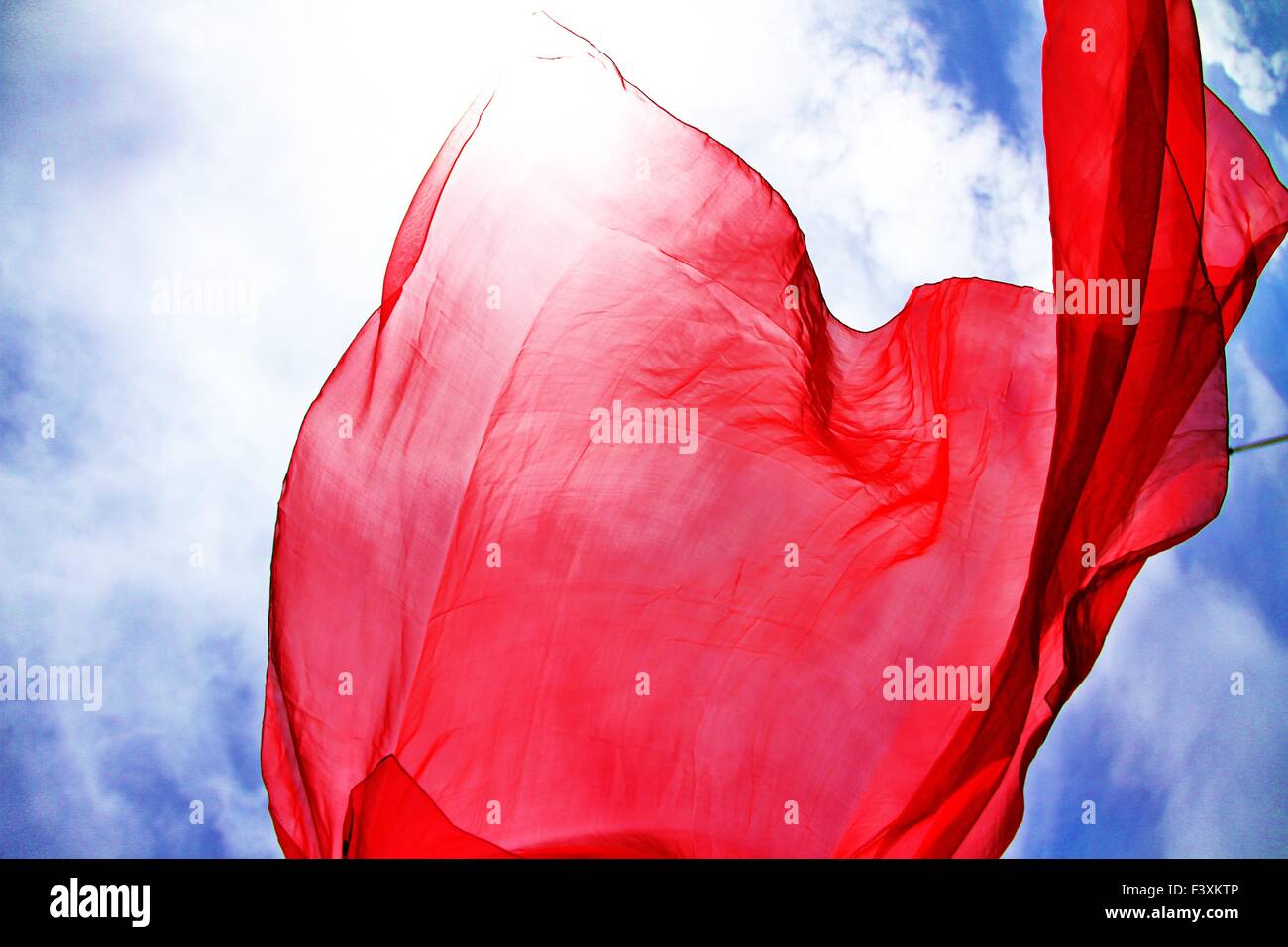 red silk in the sunlight Stock Photo