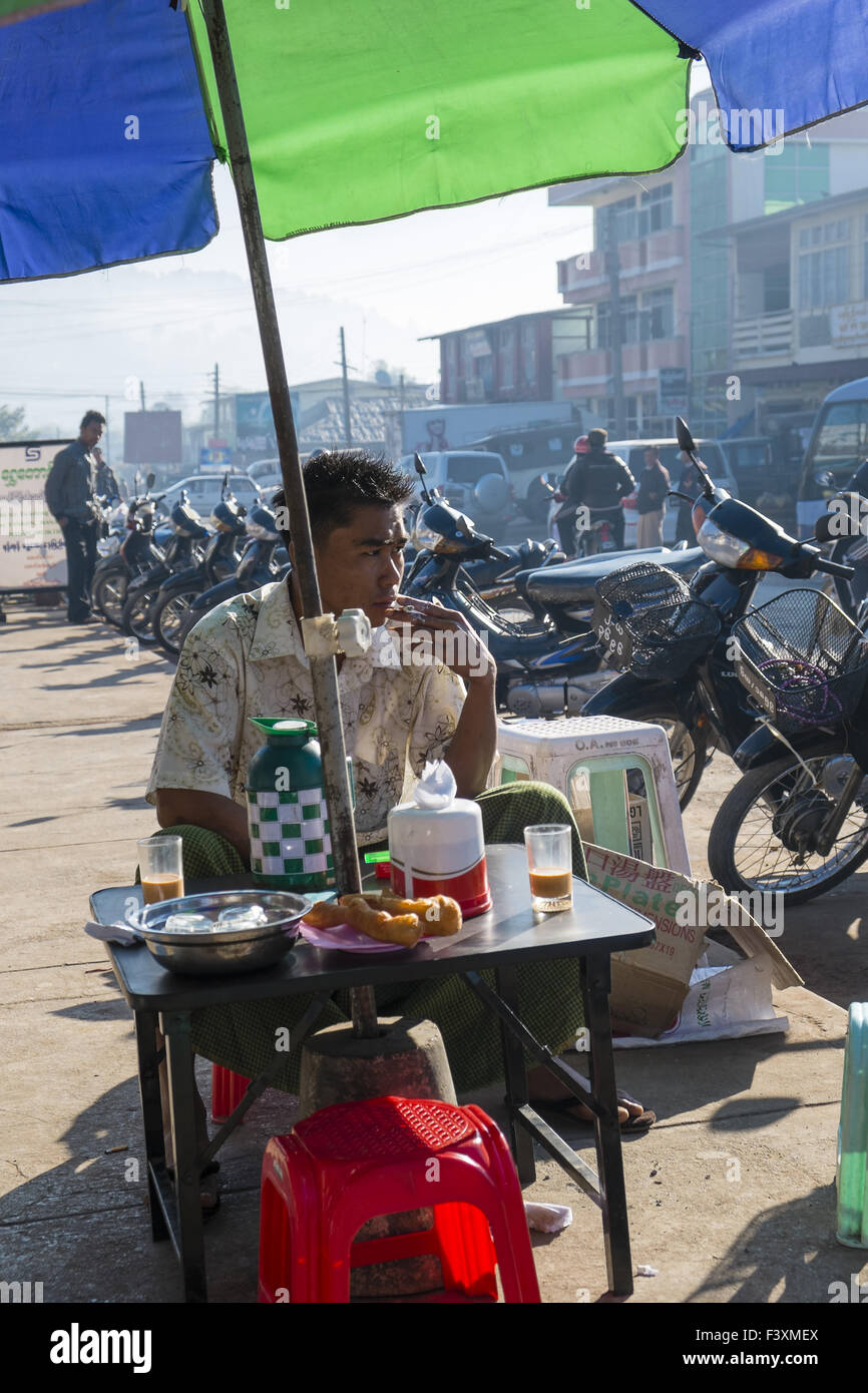 Young man in tearoom, Kalaw, Myanmar, Asia Stock Photo