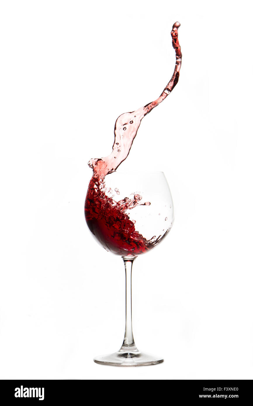 Red wine splash Glass with white background Stock Photo