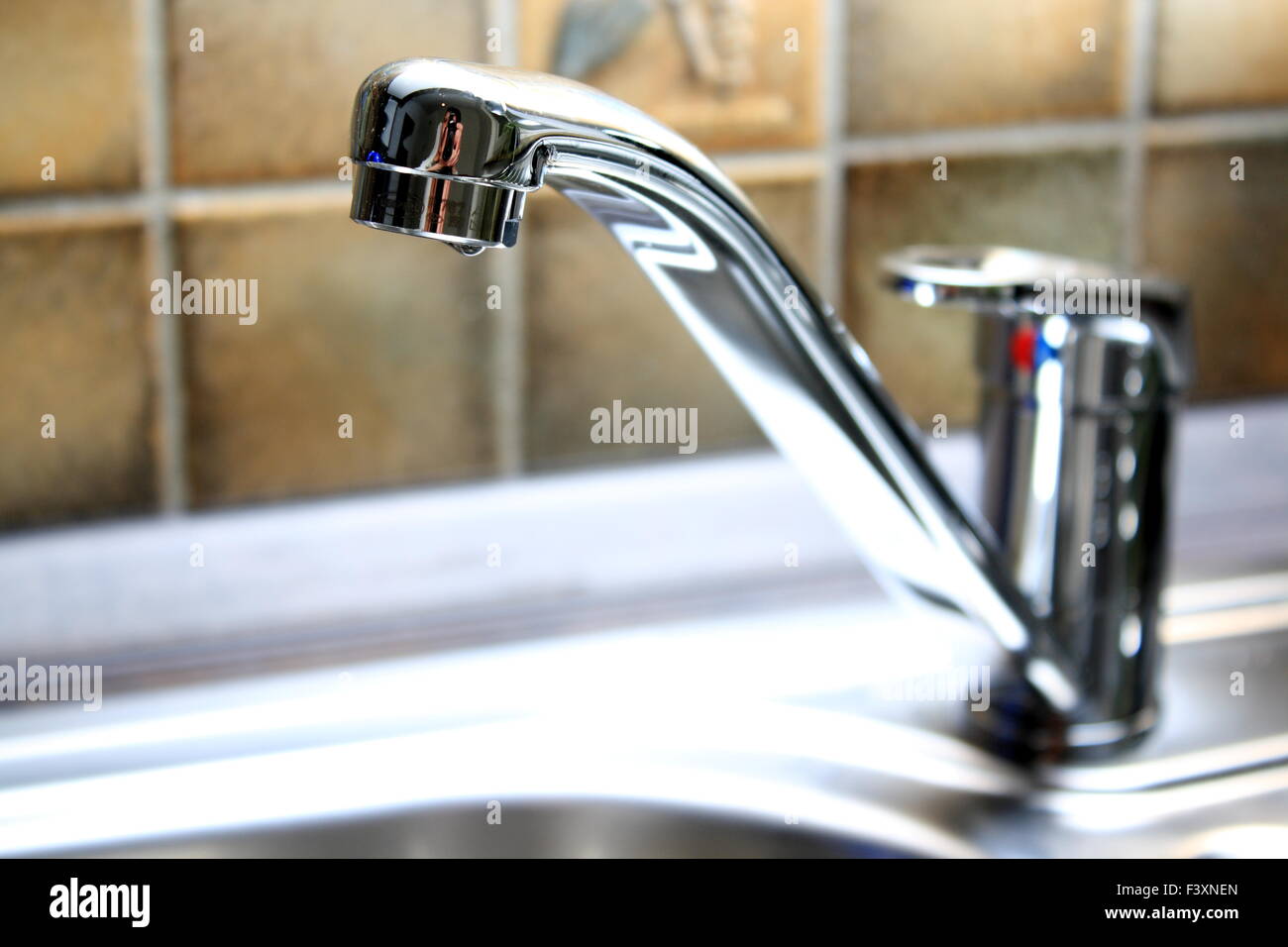 faucet dripping, water tap without background Stock Photo