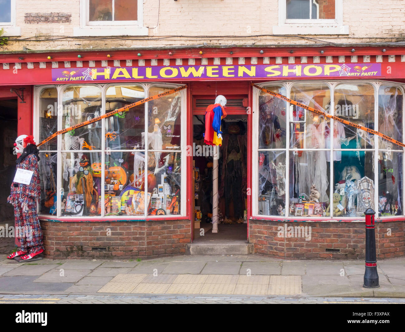 A temporary popup shop selling Halloween clothes and accessories in