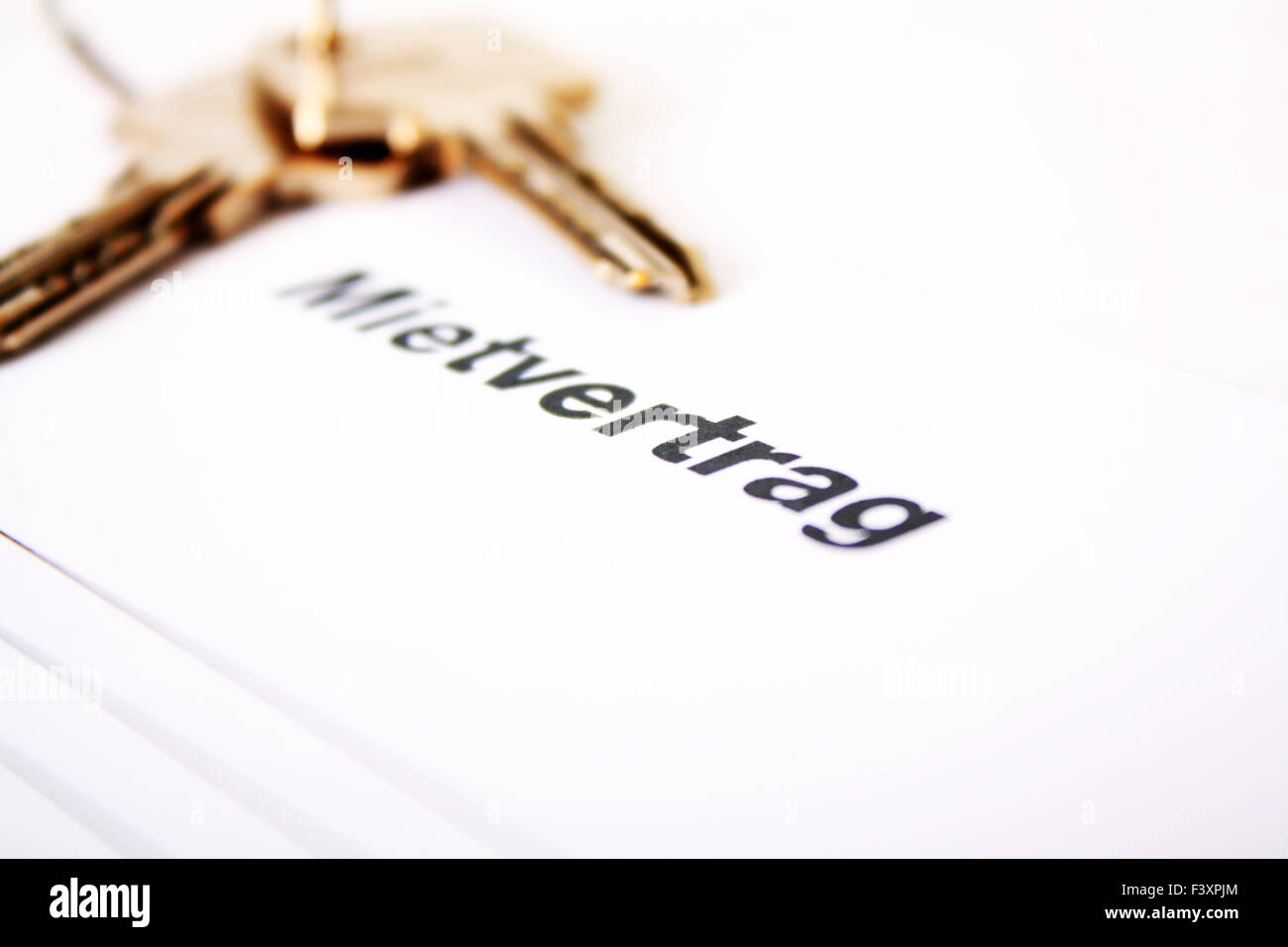 Rental aggrement form with keys Stock Photo