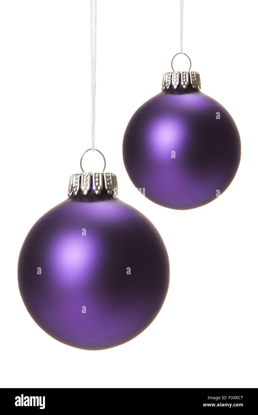 purple christmas balls isolated hanging Stock Photo