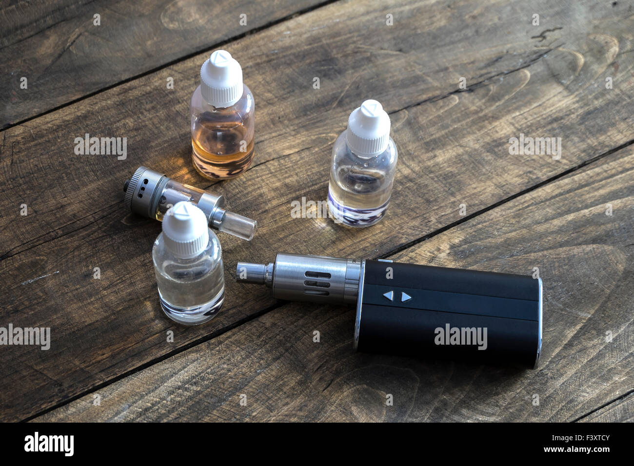 e-cigarettes with different re-fill bottles,from above Stock Photo