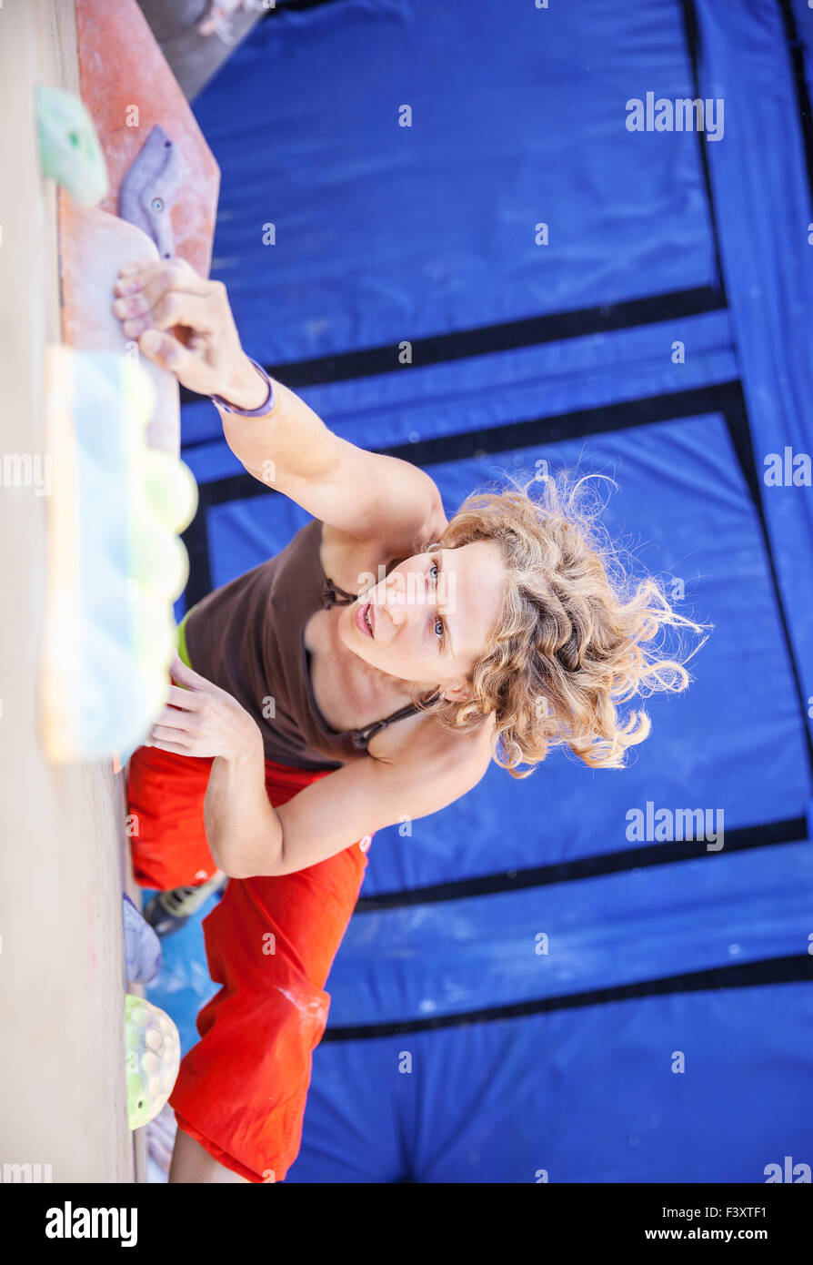 Female climber on artificial climbing wall Stock Photo Alamy
