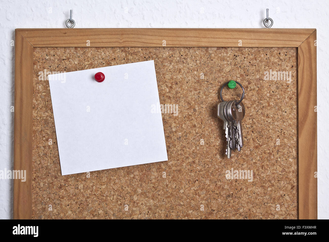 Corkboard with key Stock Photo Alamy