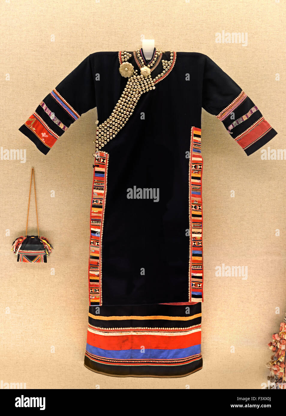 Woman's garment with appliqué design and silver adornments Lahu ( Lancang Yunnan ) 2nd half 20th Century Shanghai Museum of ancient Chinese art China Stock Photo