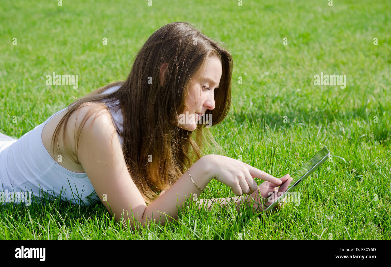 Young woman using tablet notebook Stock Photo
