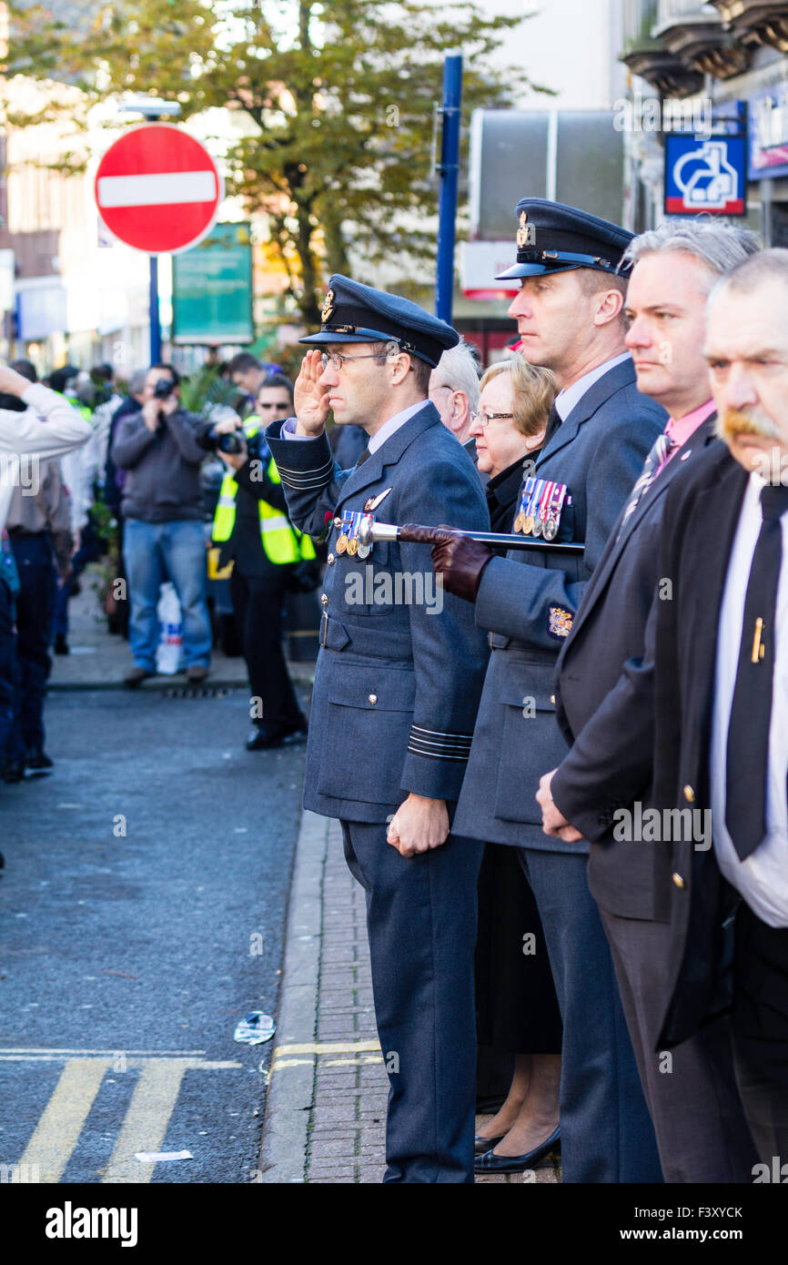 View along lines of senior officers standing saluting as a Remembrance