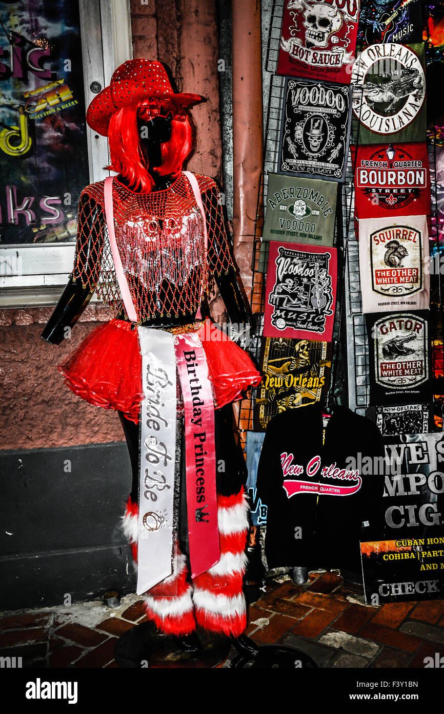 Mannequin with wacky outfit  beckons shoppers outside souvenir shop on Bourbon Street in the French Quarter, New Orleans, LA Stock Photo