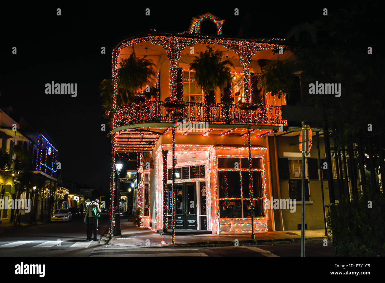 Elaborate Christmas light decorations highlight a classic French Quarter Creole Townhouse