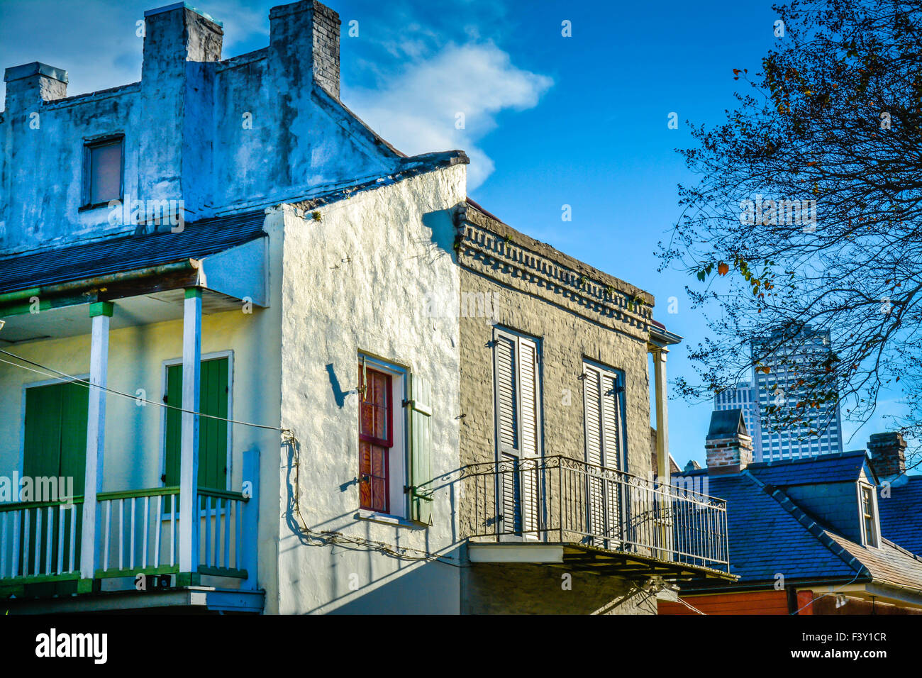 An old rustic apartment building's patina and age show at sunset in the