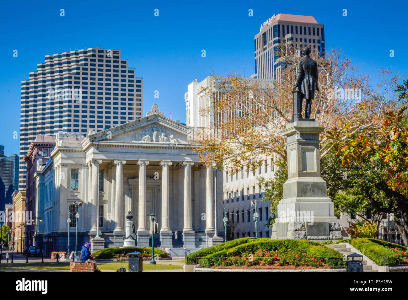 Statue of Henry Clay with Gallier Hall in the background in Lafayette