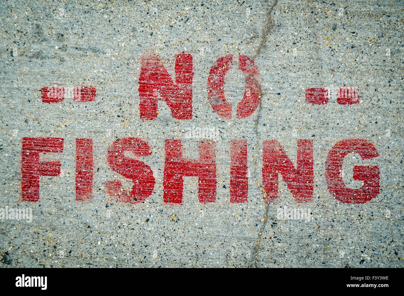 No Fishing Sign On Cement Stock Photo