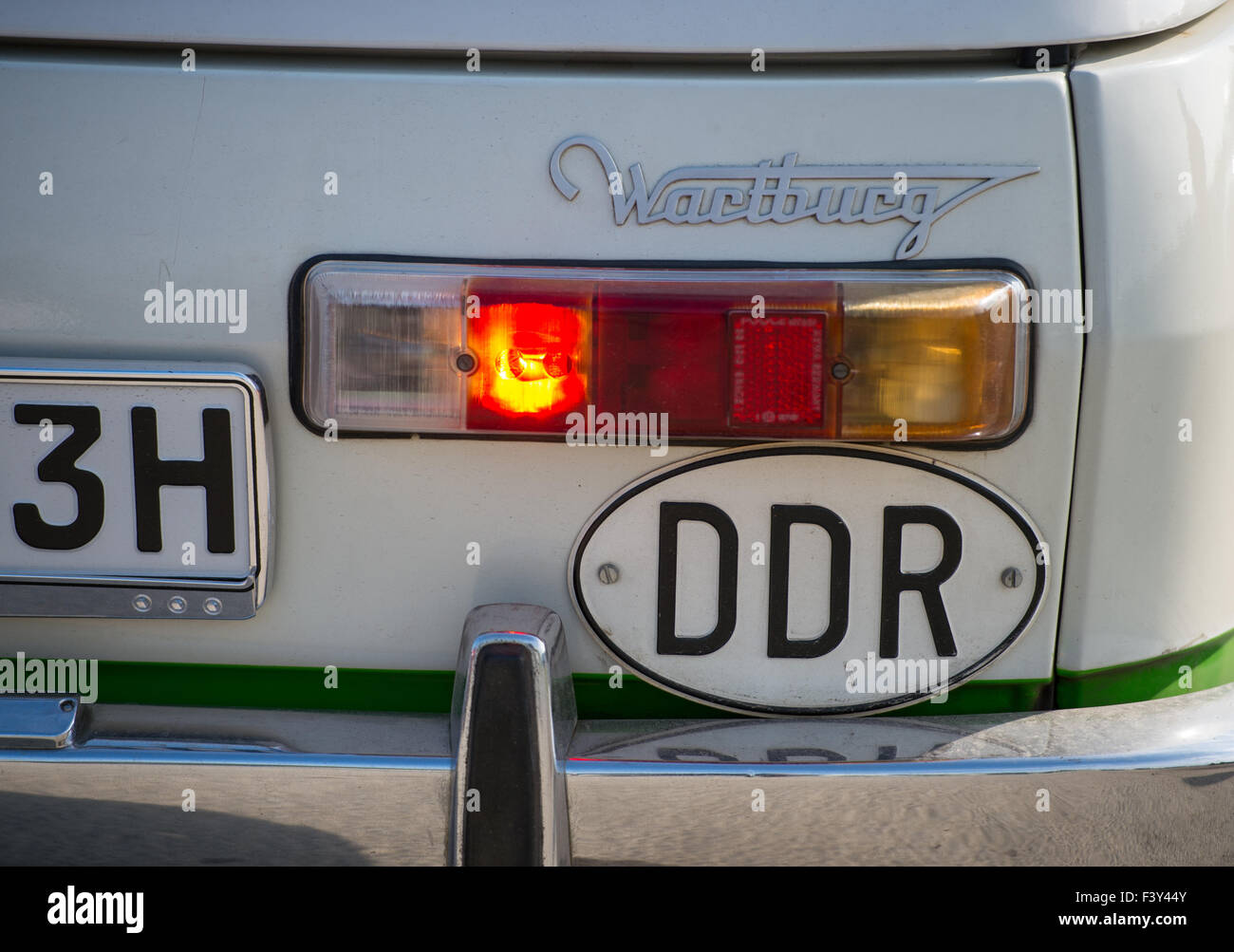 Lauchhammer, Germany. 26th Sep, 2015. The tail section including the tail lights and a sign that reads 'DDR' (short for German Democratic Republic, GDR) of a Wartburg car in Lauchhammer, Germany, 26 September 2015. Photo: Patrick Pleul/dpa/Alamy Live News Stock Photo