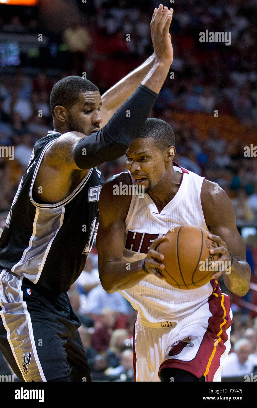 Miami Heat's LeBron James gets control of the ball againstSan Antonio Spurs'  Kawhi Leonard (2) during the first quarter at AmericanAirlines Arena in  Miami, Florida, Tuesday, January 17, 2012. (Photo by Pedro