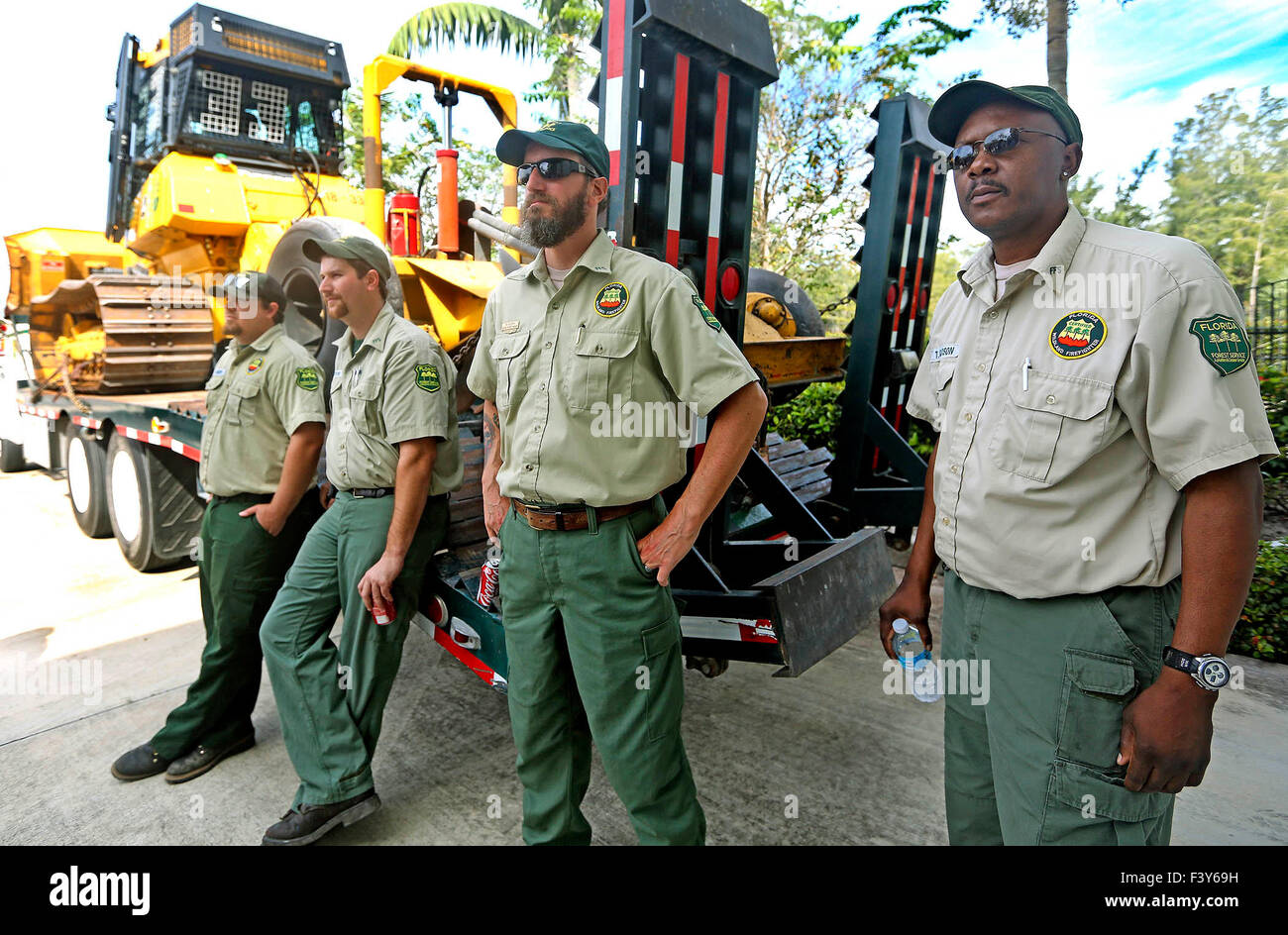 Oct. 11, 2015 - West Palm Beach, Florida, U.S. - Florida Forest Rangers, John Greer, (L) Thomas Gorton, Senior Ranger Ed Aldrich, and Terrance Gadson, during the Seventh Annual First Responders Day Sunday Oct. 11, 2015, at WPB Fire Department station seven in West Palm Beach. (Credit Image: © Bill Ingram/The Palm Beach Post via ZUMA Wire) Stock Photo