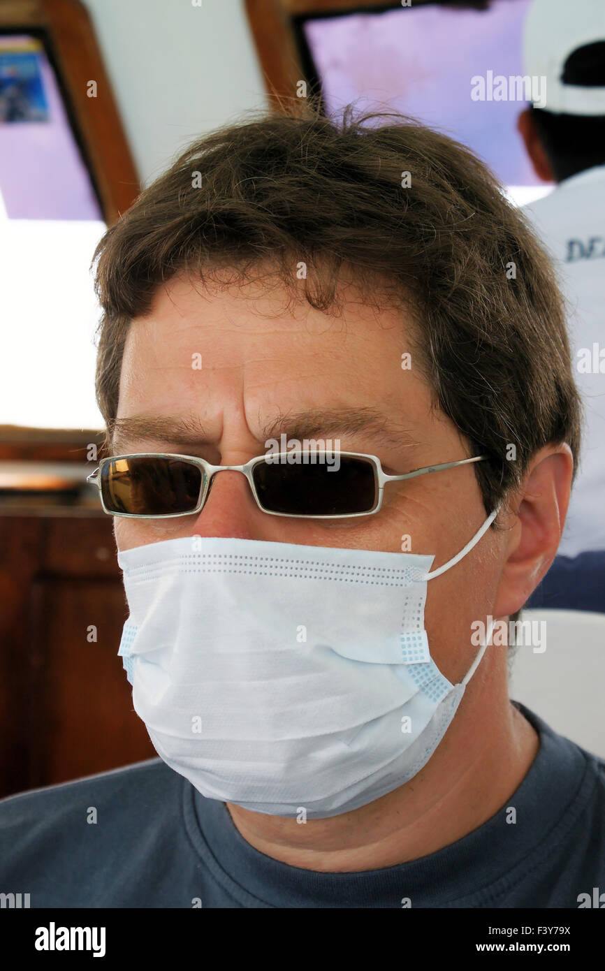 man with medical mask to avoid infections Stock Photo