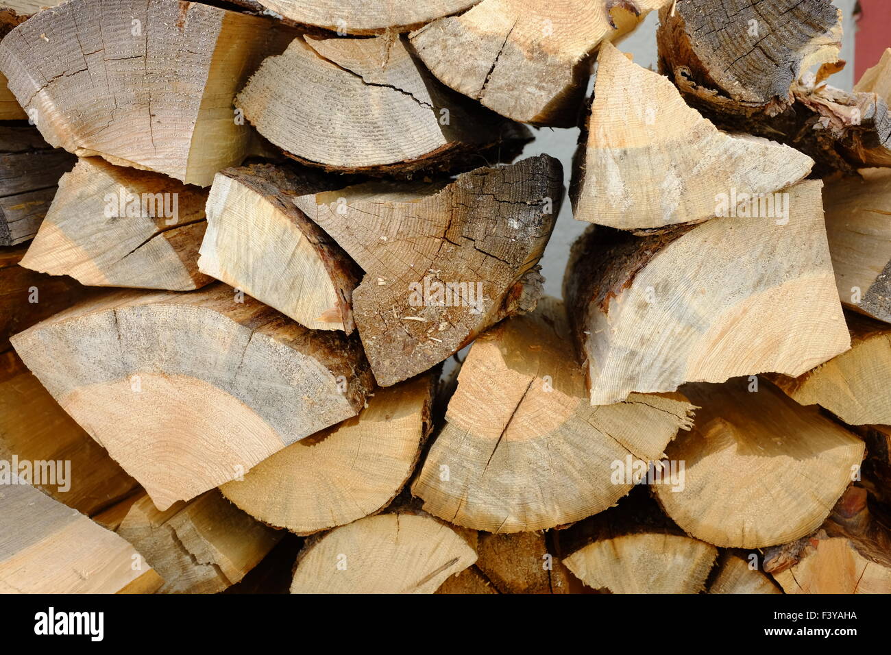 Firewood cut and split, ready for burning Stock Photo Alamy