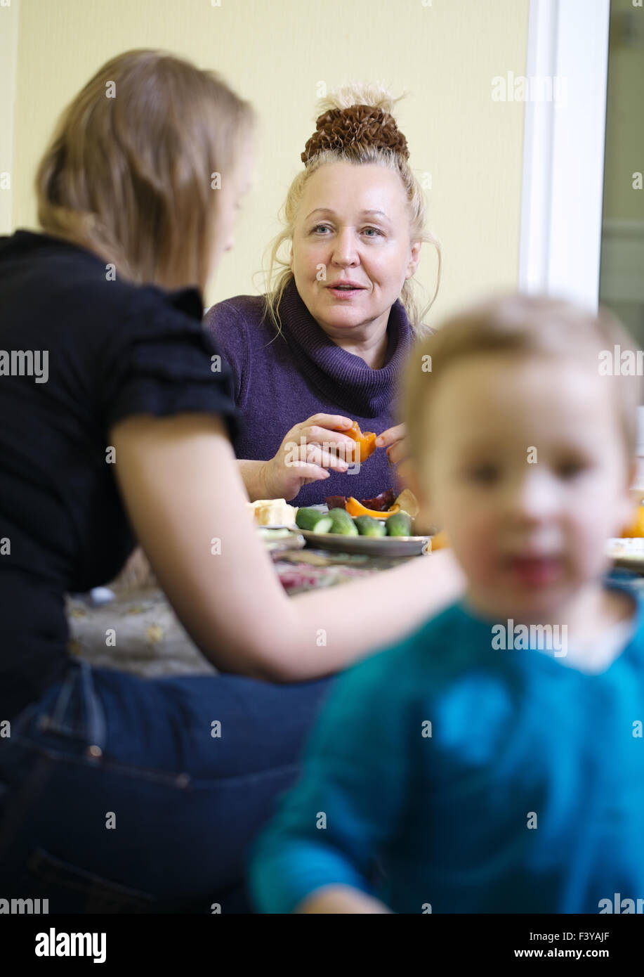 Elderly mother and daughter enjoying a meal Stock Photo