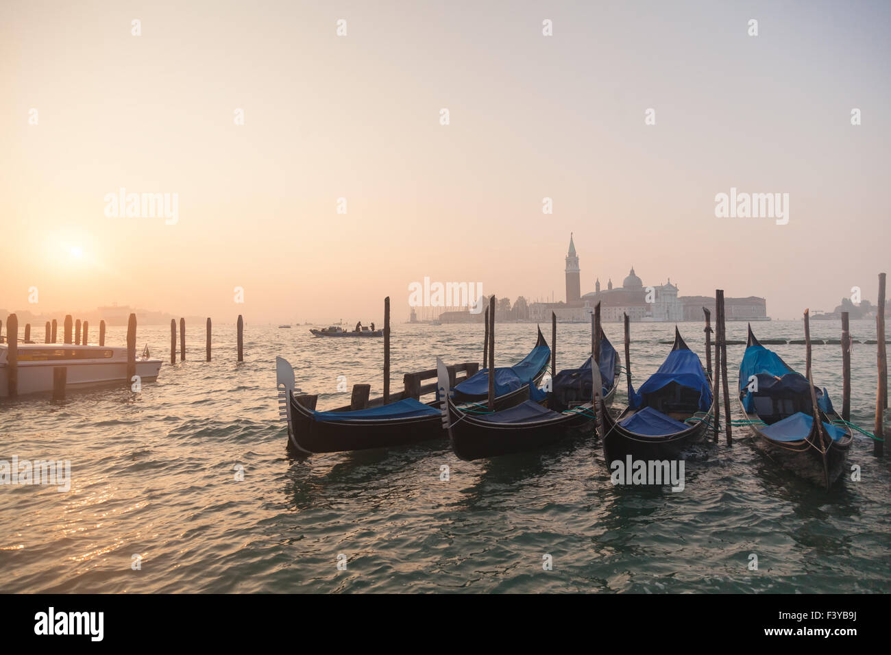 Gondolas sunrise in venice hi-res stock photography and images - Alamy