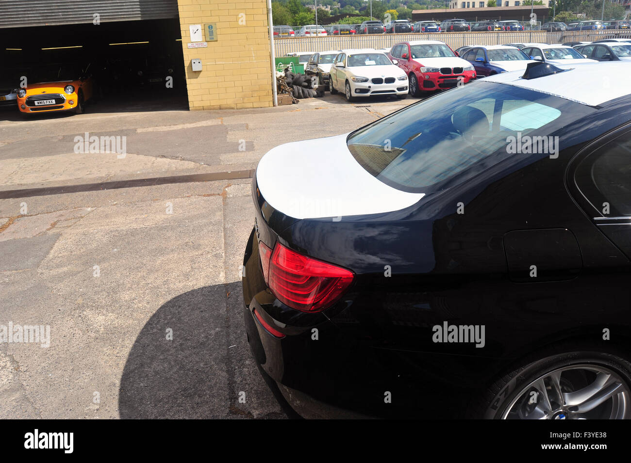Brand new BMW cars still covered in white tape at a BMW dealership in Bath. Stock Photo
